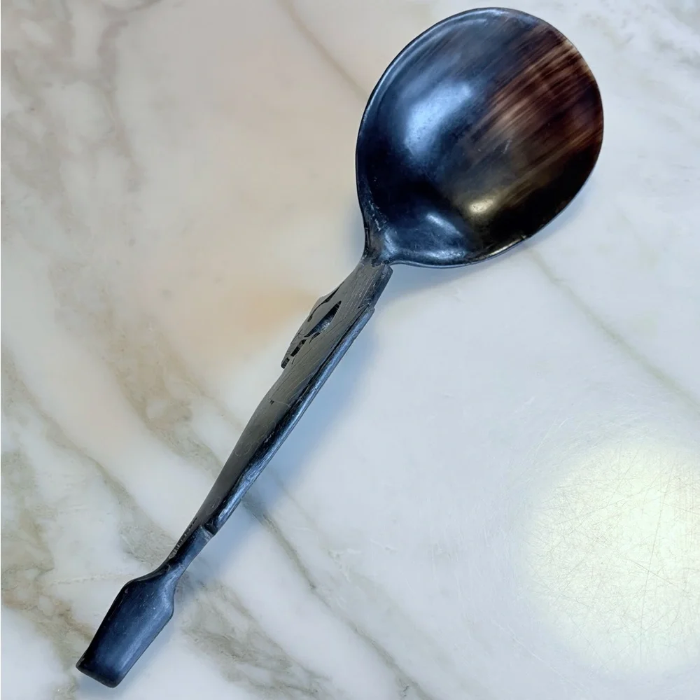 Rare vintage dark horn carved bird serving spoon